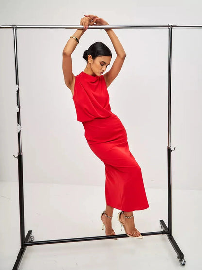 Model showcasing a chic Red Drape Maxi Dress, perfect for formal events and special occasions.
