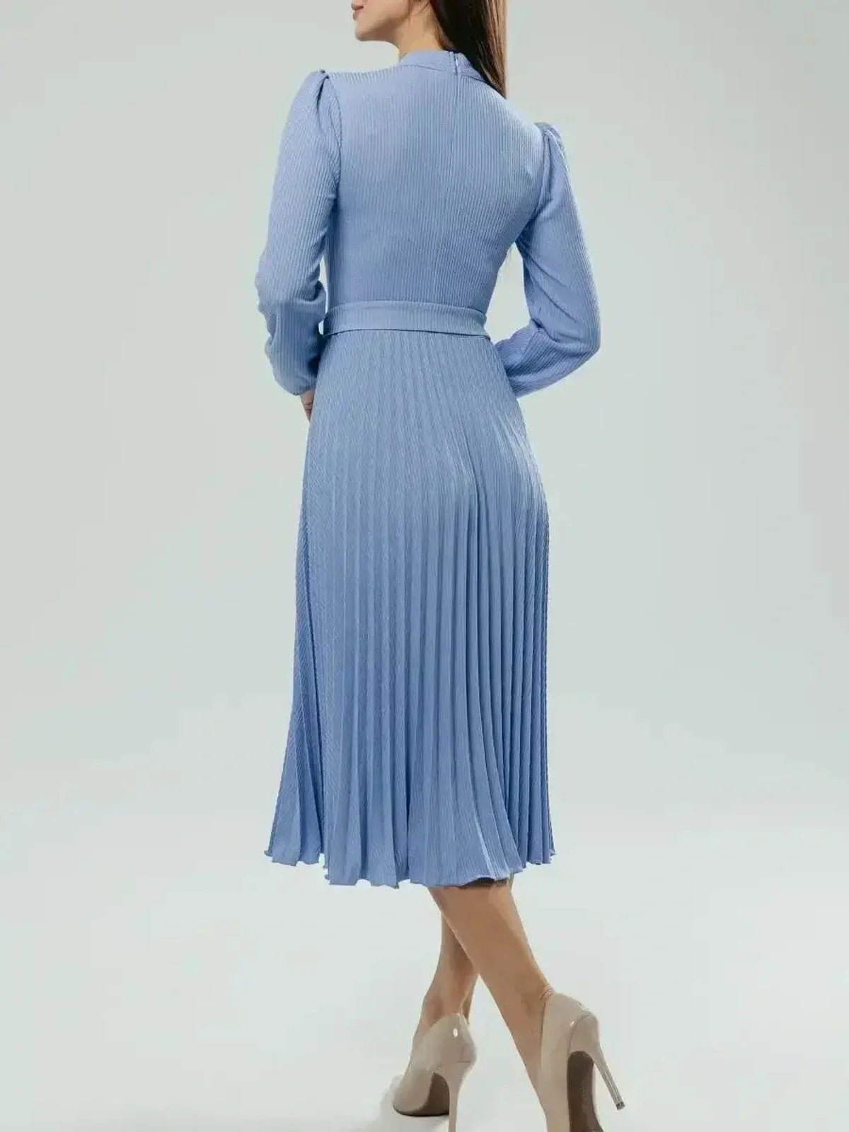 Back view of an Elegance Midi Dress in powder blue, featuring pleats and long sleeves, ideal for weddings or formal events.
