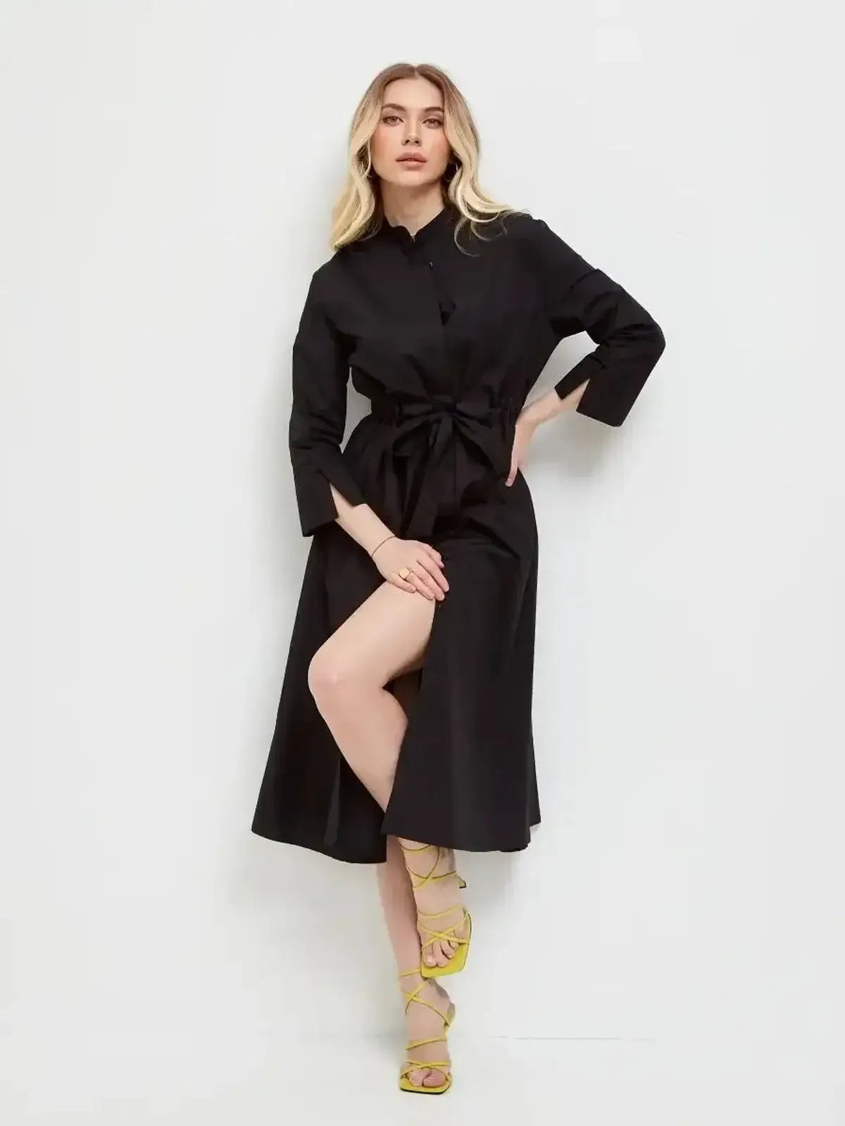 Noir Grace Midi Dress featuring a cinched waist, structured collar, and elegant A-line silhouette, ideal for various occasions.