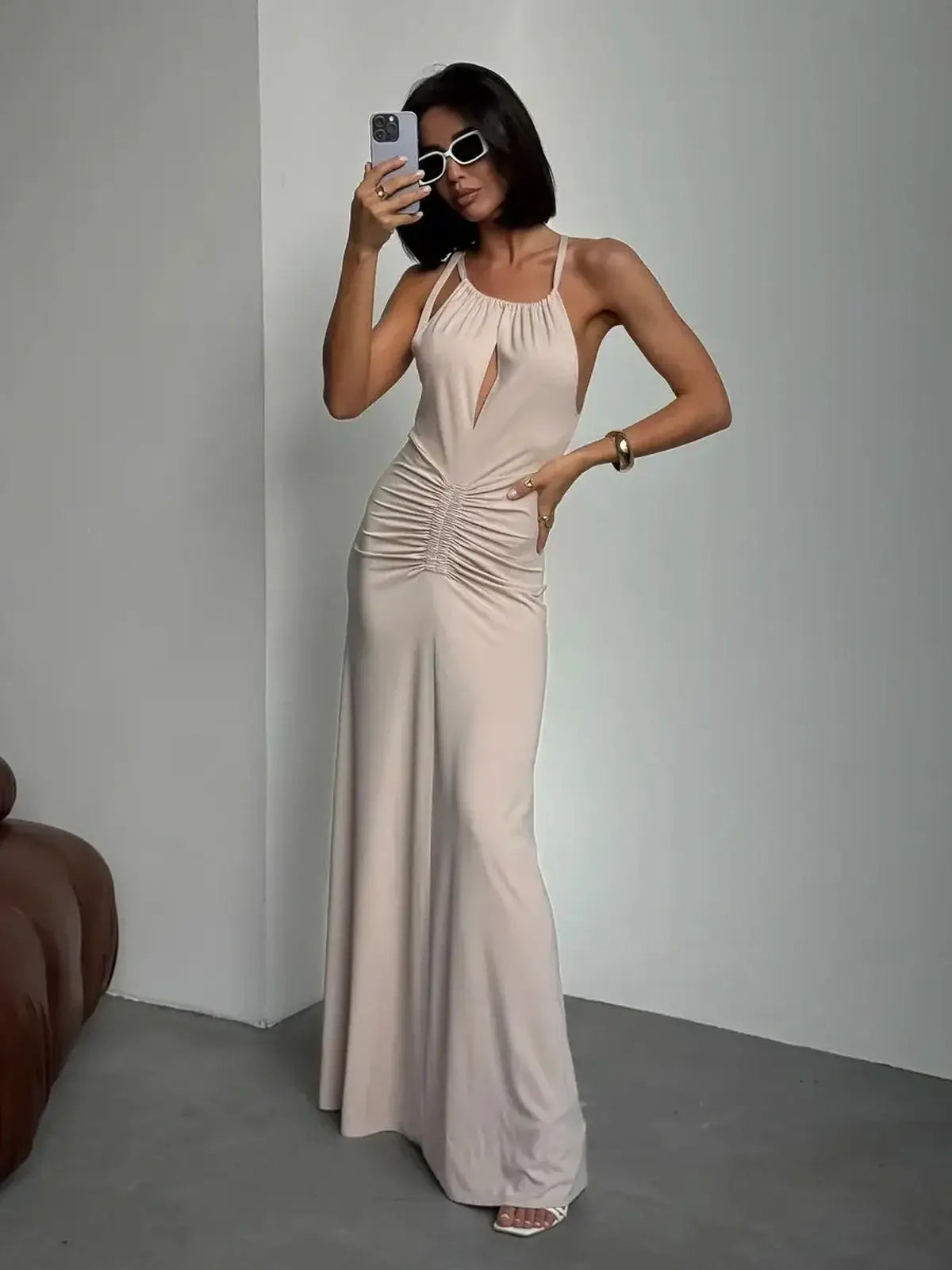 Serene Curve Maxi Dress showcasing a sculpted fit and ruched detailing, perfect for summer weddings and formal occasions.