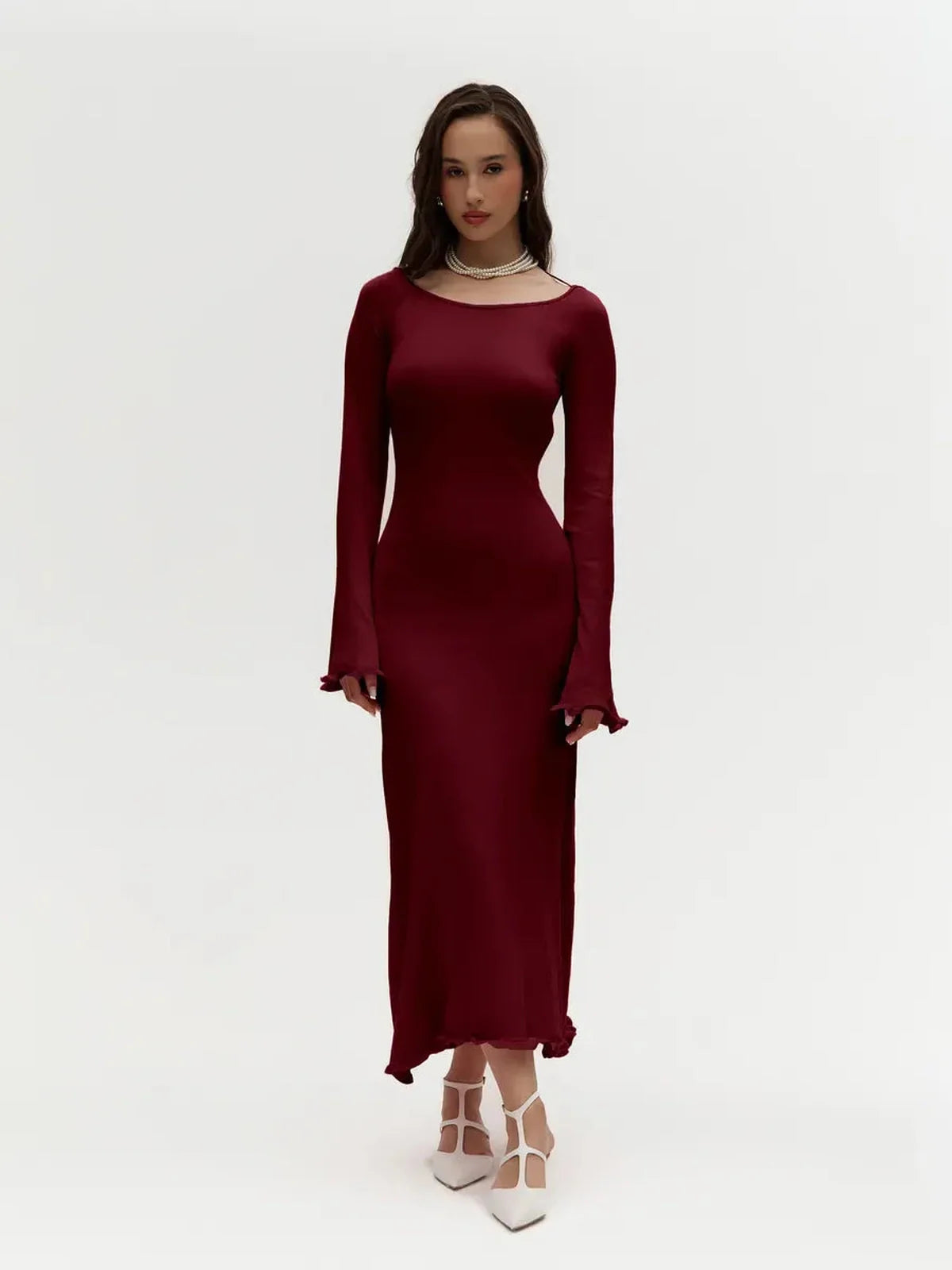 Elegant ruffle-back midi dress in burgundy, featuring long sleeves and a body-hugging fit, perfect for formal occasions.