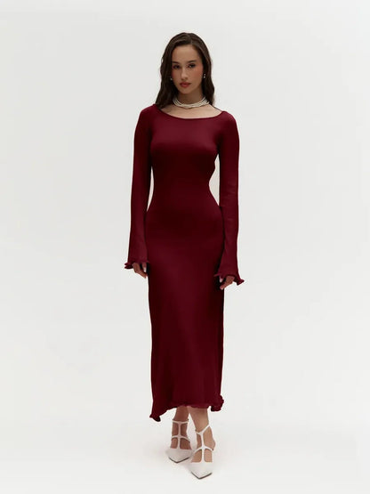 Elegant ruffle-back midi dress in burgundy, featuring long sleeves and a body-hugging fit, perfect for formal occasions.