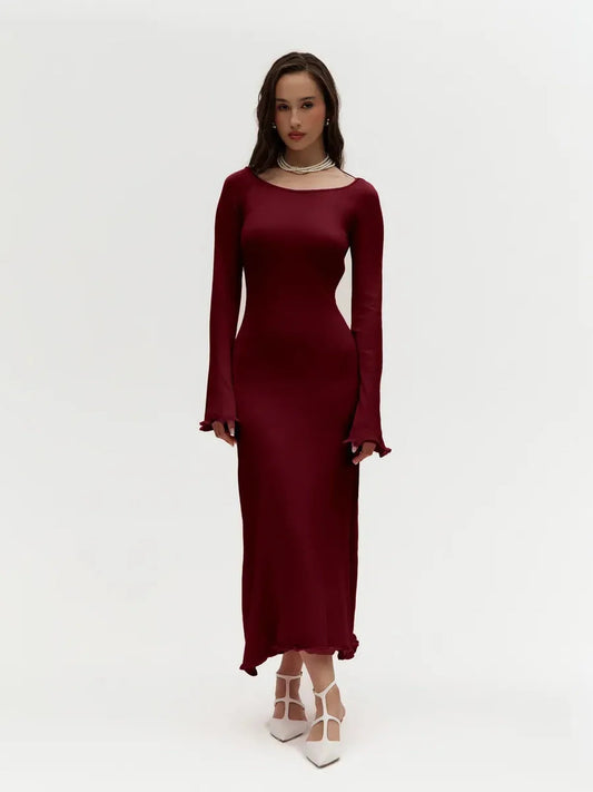 Elegant ruffle-back midi dress in burgundy, featuring long sleeves and a body-hugging fit, perfect for formal occasions.