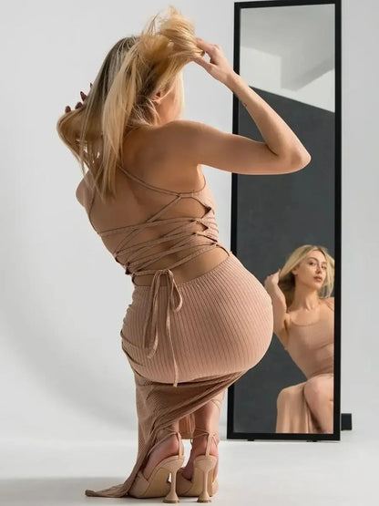 Nude Lace Midi Dress featuring a sculpting ribbed fit and corseted back, perfect for summer or formal occasions.