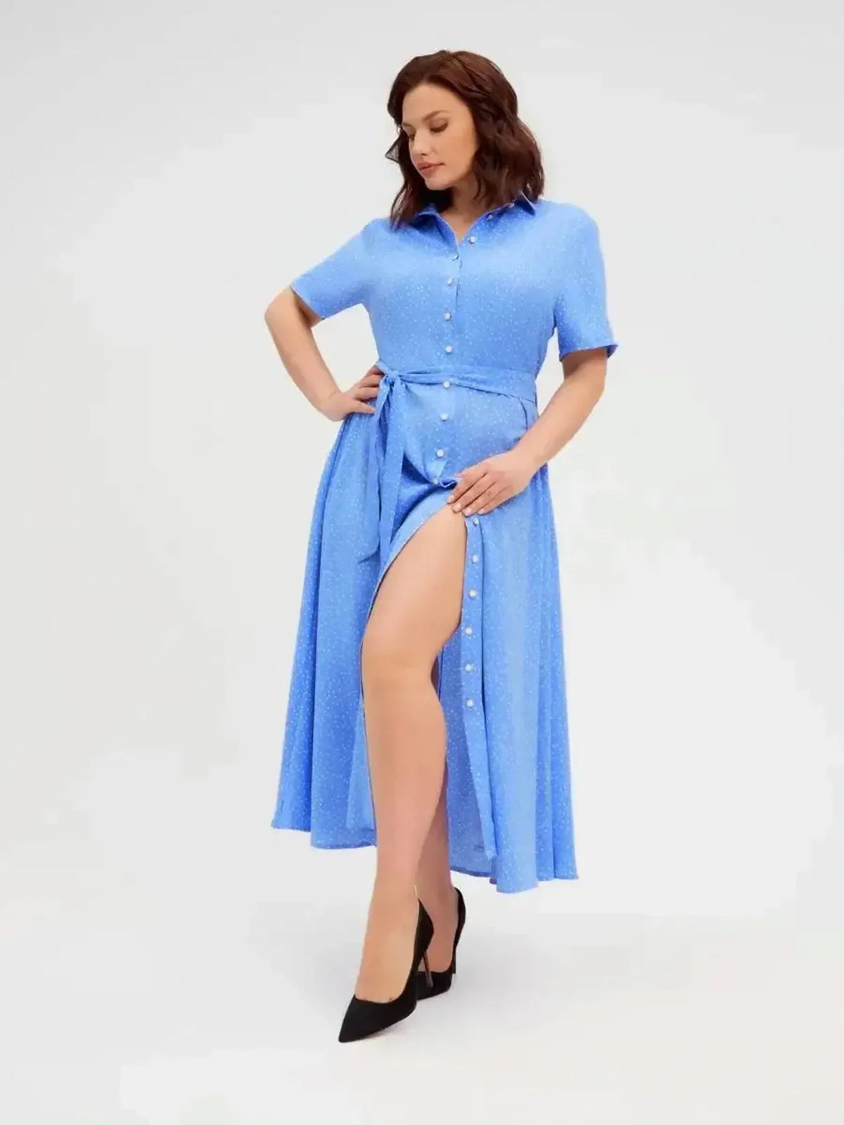 Skyline Dot Midi Dress in light blue, featuring white polka dots and a stylish button front, perfect for summer and special occasions.