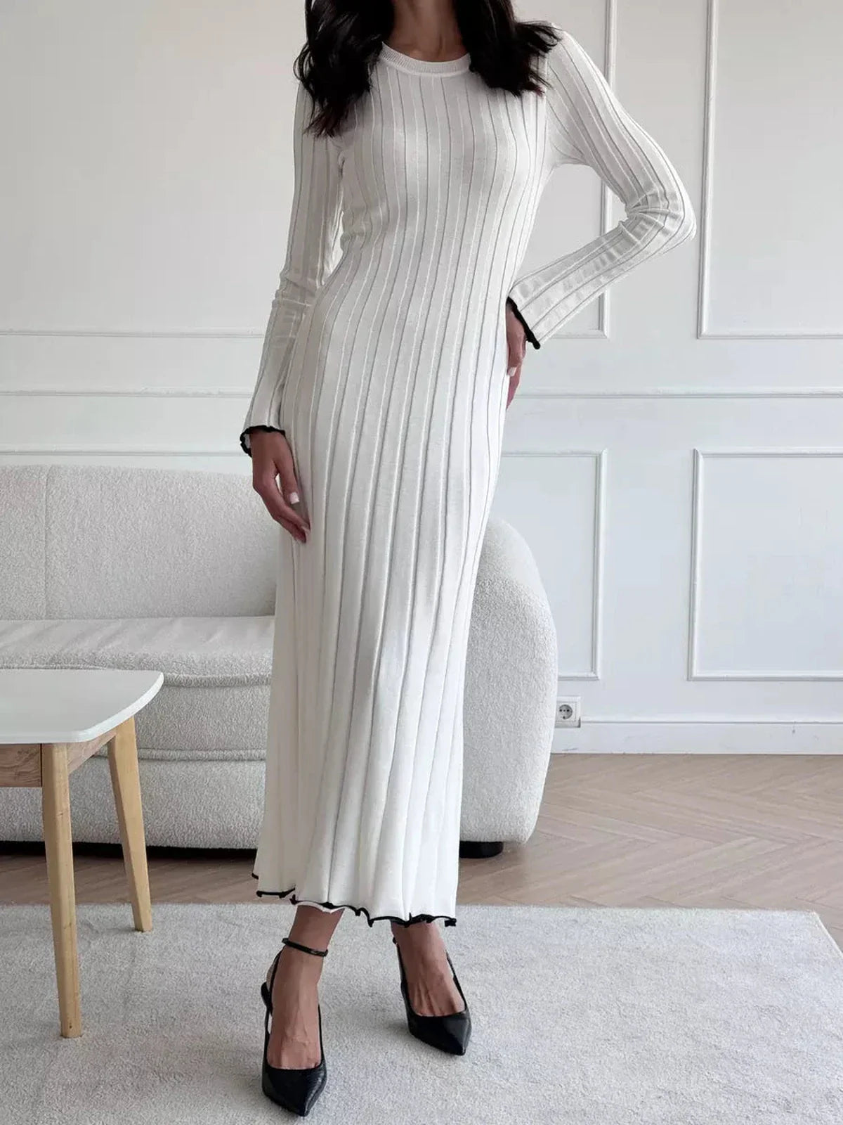Ivory Grace Maxi Dress featuring ribbed texture and delicate ruffle trim, ideal for weddings, proms, or summer outings.