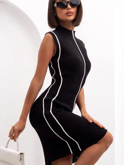 Black Sculpted Edge Midi Dress with architectural piping, perfect for summer events and formal occasions.