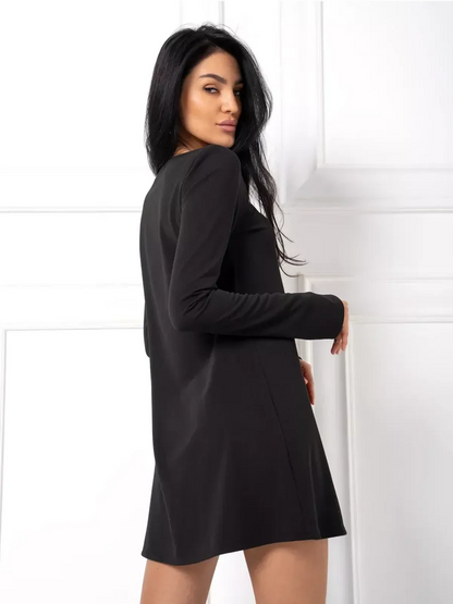 Midnight Flow black mini dress showcasing a minimalist silhouette and elegant long sleeves, perfect for weddings and casual outings.