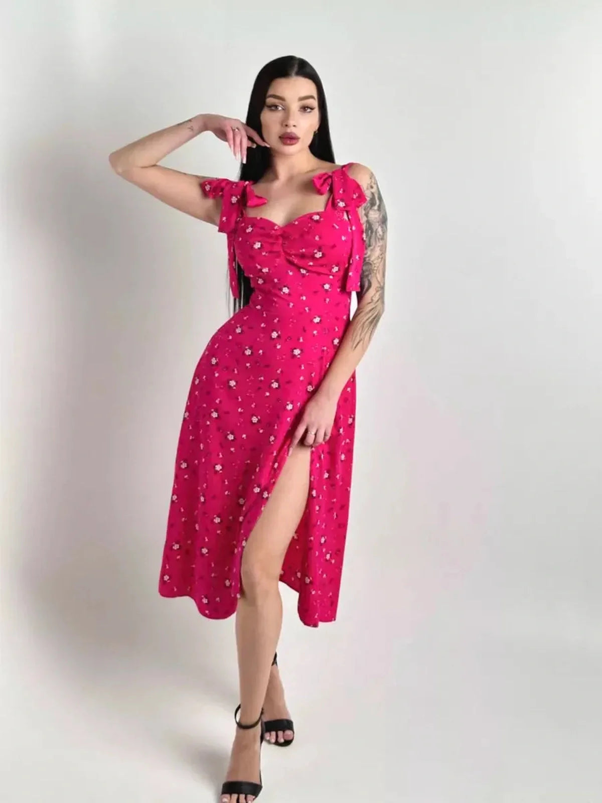 Rosé Charm Midi Dress in vibrant pink floral print with sweetheart tie detail, ideal for summer weddings and special events.