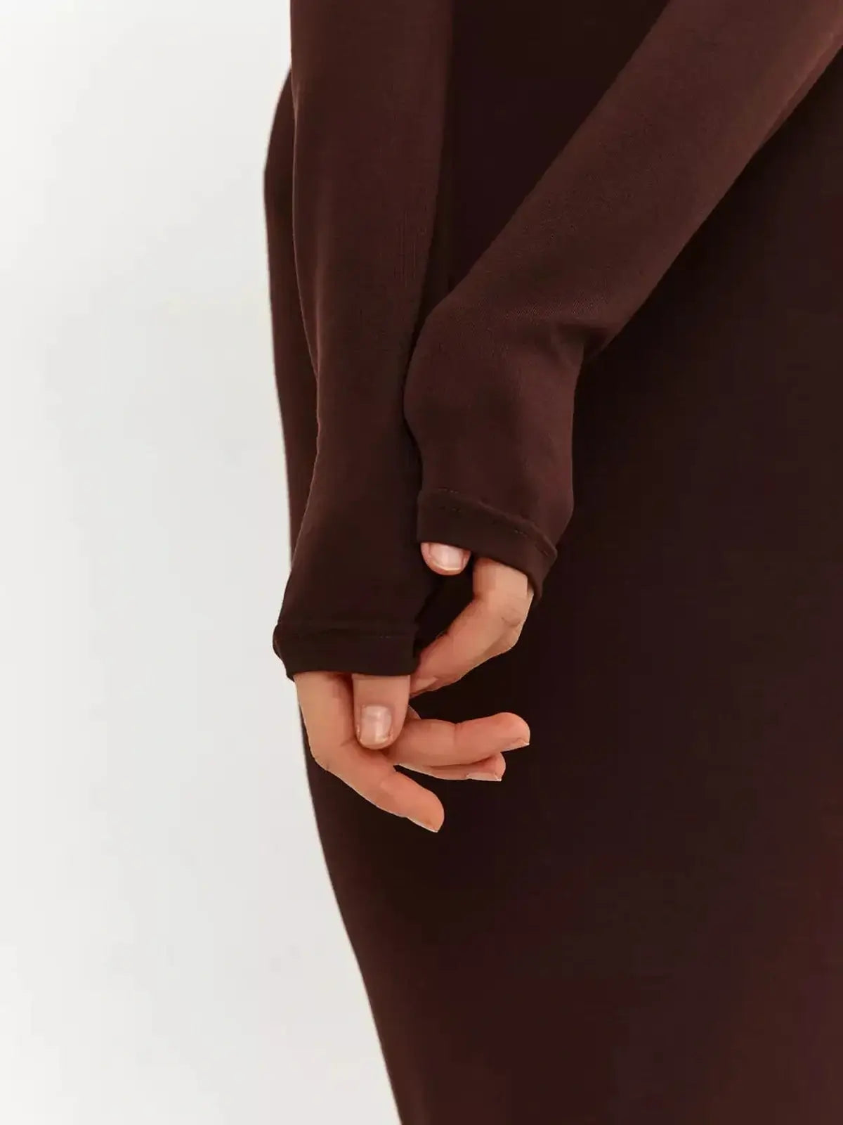 Detail of the Sculpt Maxi Dress showcasing hooded elegance and a sleek chocolate-toned silhouette.