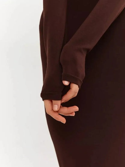 Detail of the Sculpt Maxi Dress showcasing hooded elegance and a sleek chocolate-toned silhouette.
