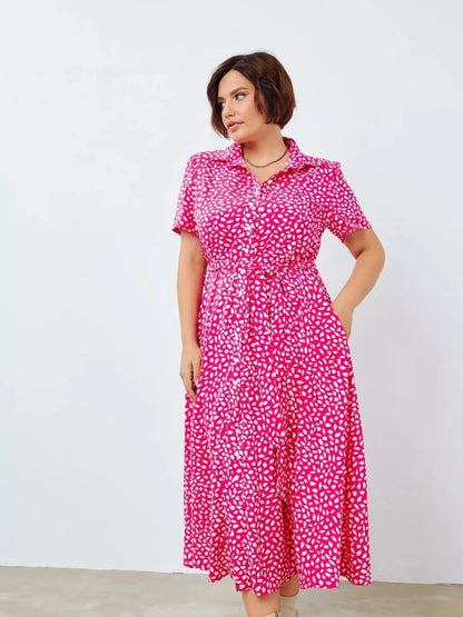 Petal Pop Midi Dress in vibrant fuchsia with white petal print, perfect for weddings and summer events.