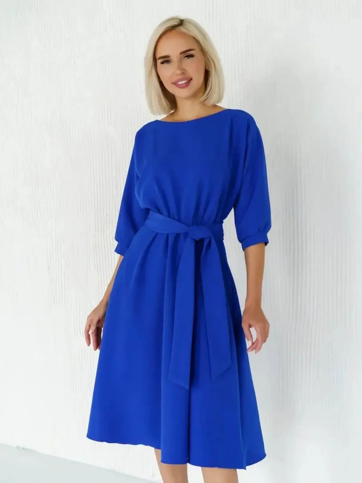 Sapphire belted midi dress in vibrant blue, perfect for wedding guest, formal events, or summer occasions.