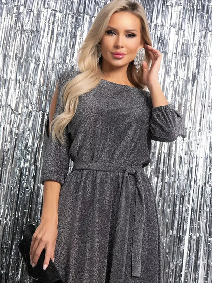 Luna Shine Midi Dress featuring shimmering silver fabric and elegant design, perfect for cocktail evenings and formal events.