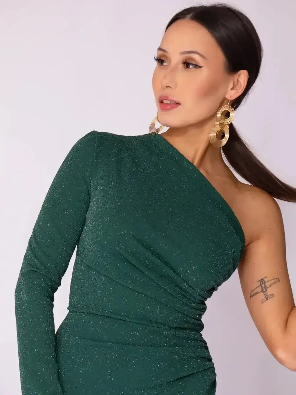 One-shoulder emerald spark maxi dress with shimmer, perfect for weddings, proms, and formal occasions.