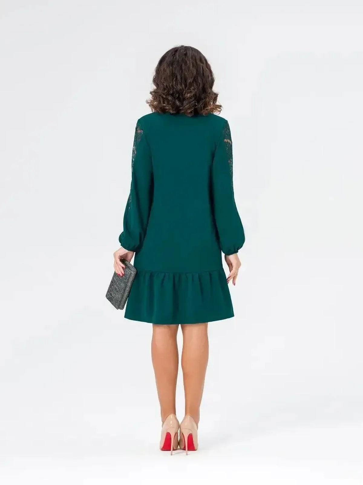 Elegant green lace mini dress with long sleeves and flared hem, perfect for weddings or special occasions.