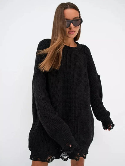 Oversized black Shadow Knit Mini dress featuring distressed texture and long sleeves, showcasing bold fashion style.