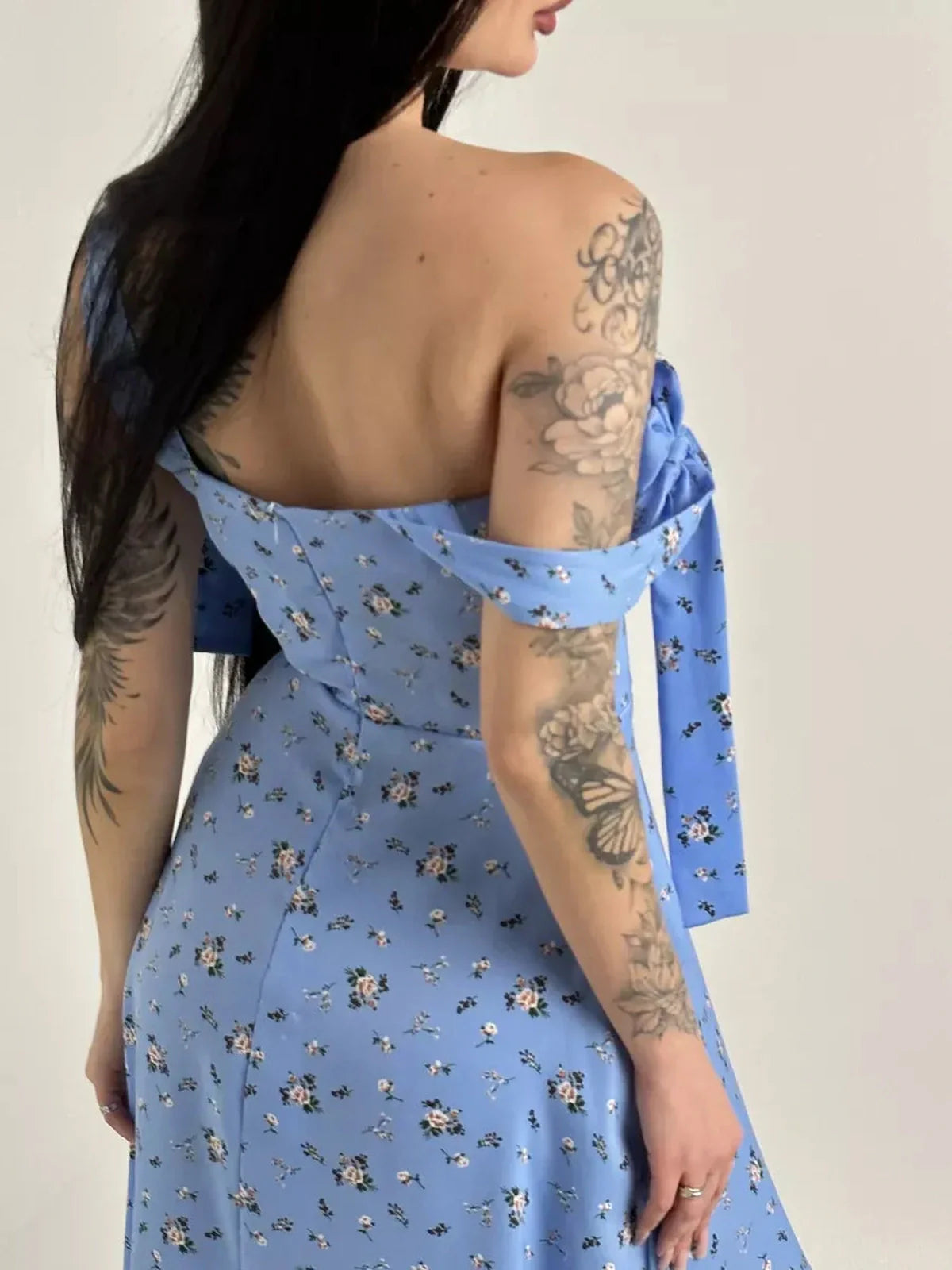 Floral Charm Midi Dress with shoulder bow ties and dainty floral prints, perfect for summer occasions and weddings.