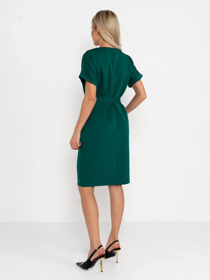 Back view of Emerald Mode green mini dress with cuffed sleeves and fabric belt, perfect for weddings and events.
