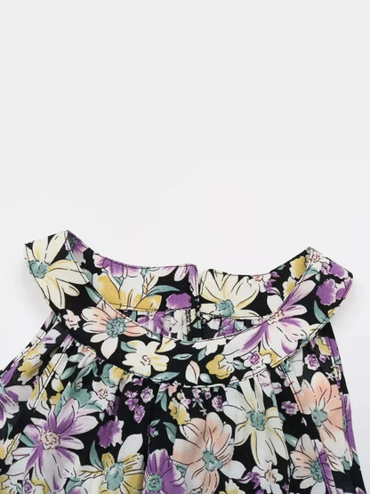 Top view of the Botanic Bloom Midi Dress featuring colorful floral patterns and a stylish halter neckline.