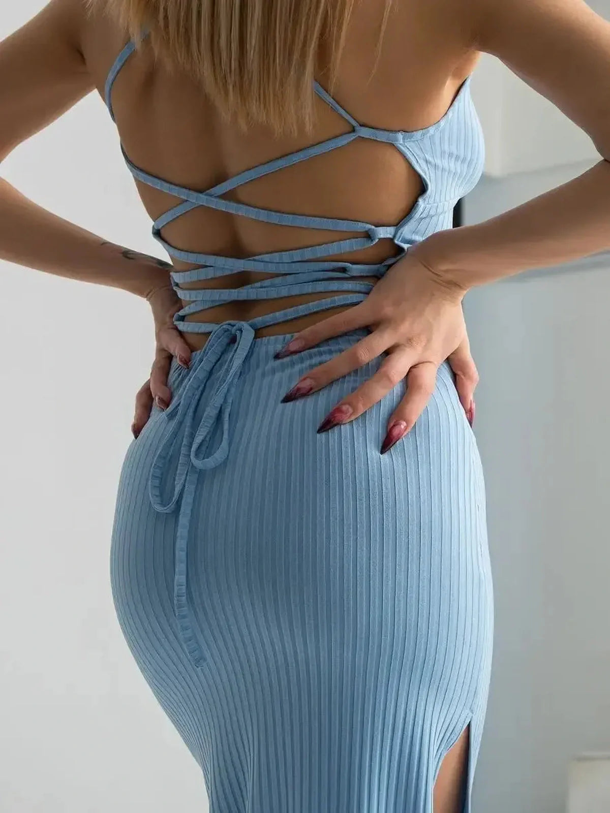 Sky Lace Midi Dress showcasing open corset back and ribbed knit design, perfect for weddings and formal events.