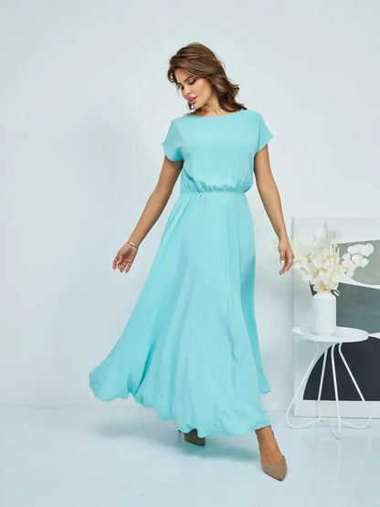 Sculpted Elegance Maxi Dress in turquoise, featuring a draped bodice and flowing skirt, perfect for summer and formal occasions.
