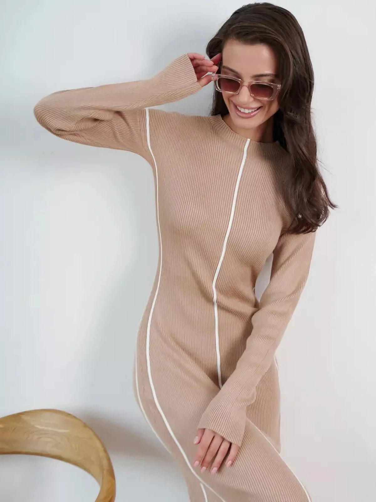 Sculpted Line Midi Dress in soft beige with contrast seams, perfect for weddings, proms, and formal events.