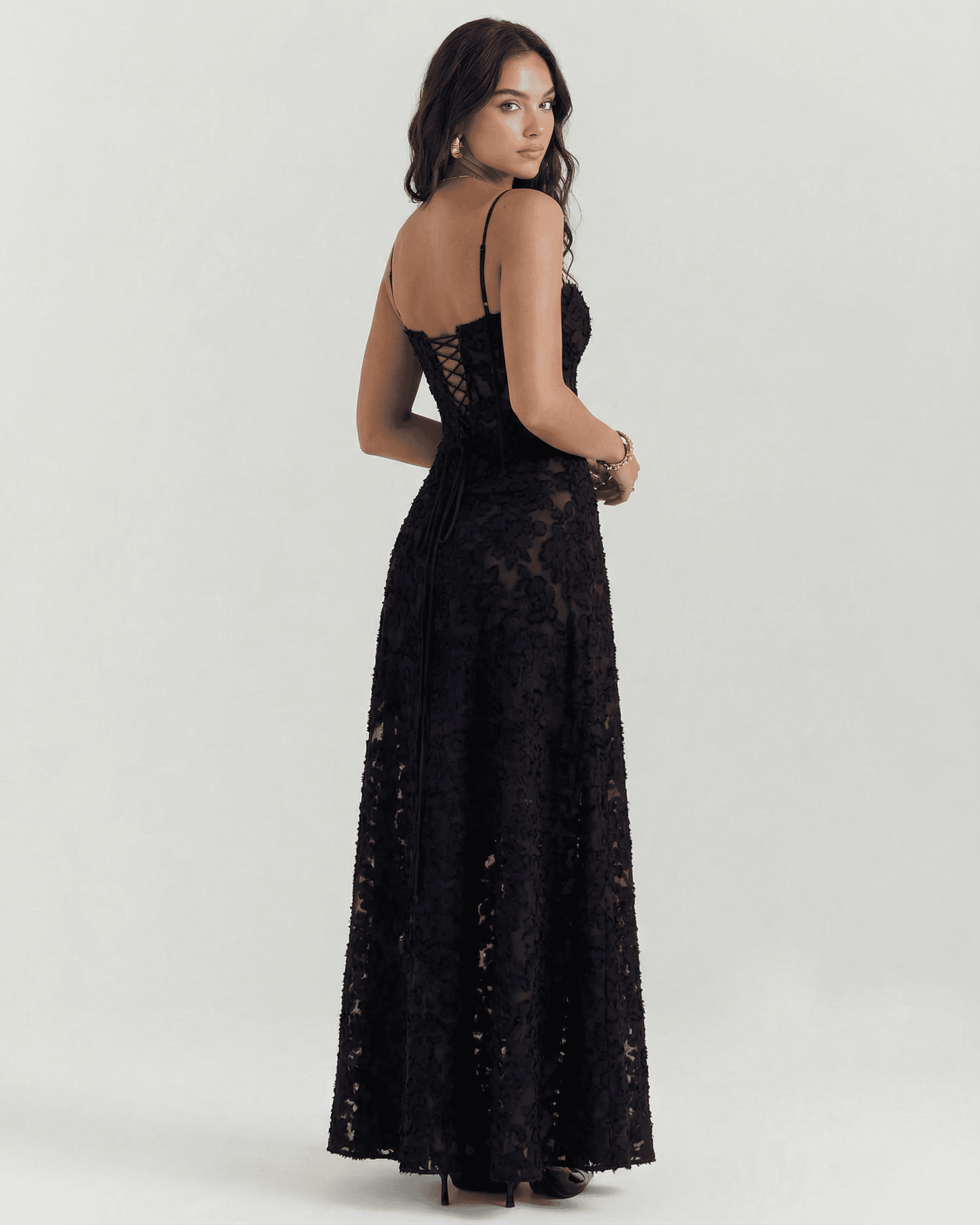 Nerina Maxi Dress by Slimona, showcasing the back view of an elegant black floral lace design.