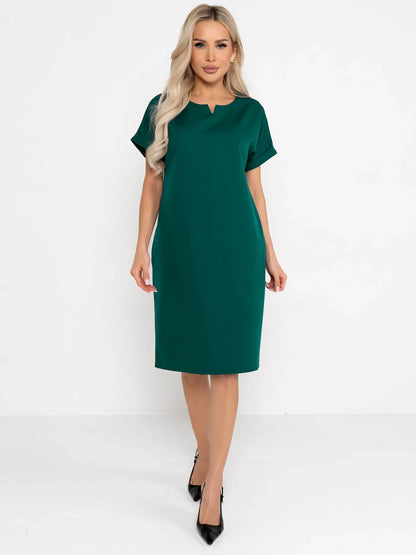 Emerald Mode green mini dress featuring cuffed sleeves and a notched neckline, perfect for weddings or formal events.