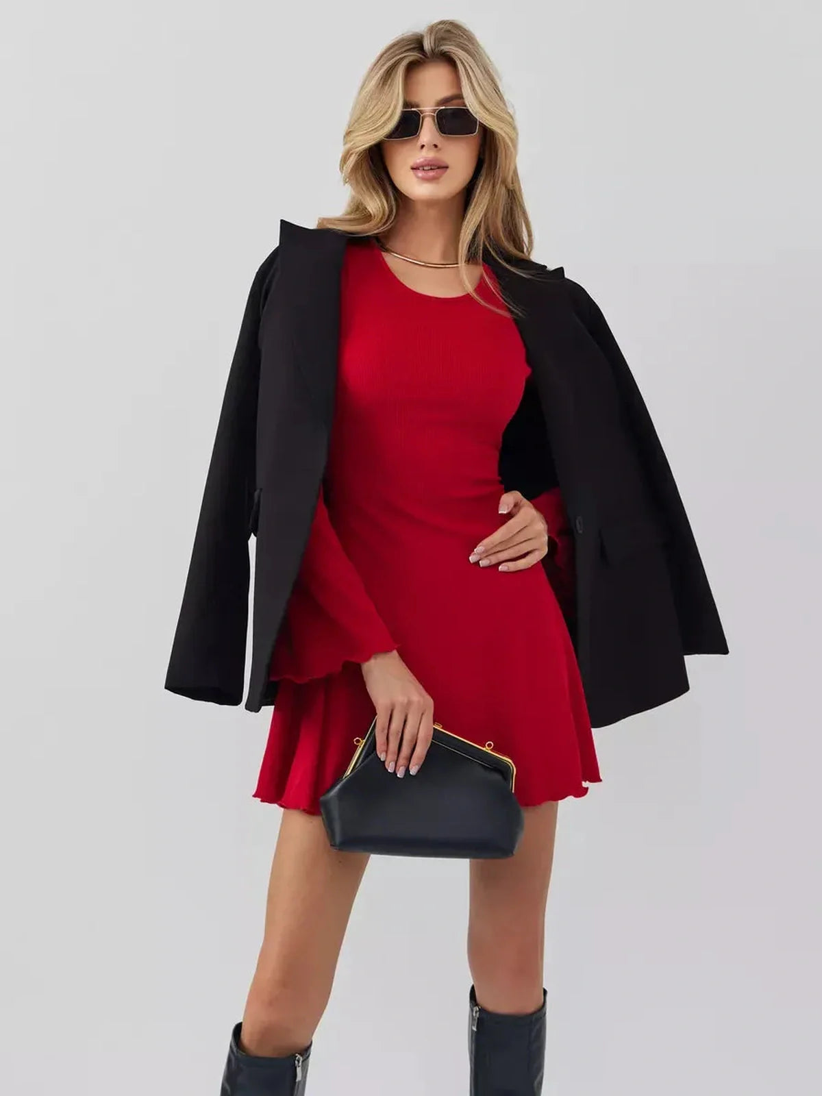 Stunning red mini dress featured with a black blazer, perfect for cocktails, parties, or special occasions.
