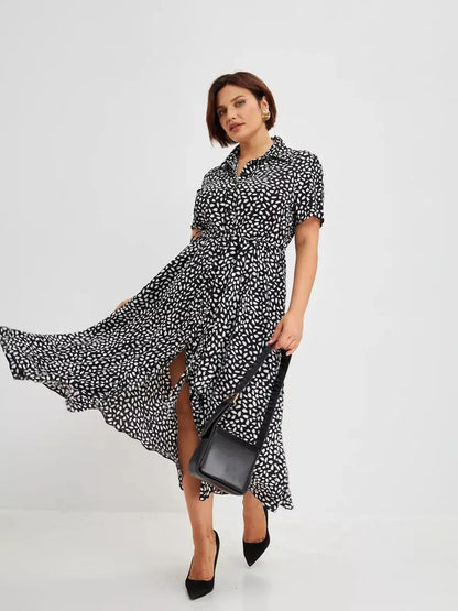 Black and white printed Monaco Midi Dress featuring a shirt-dress silhouette, perfect for weddings or casual outings.