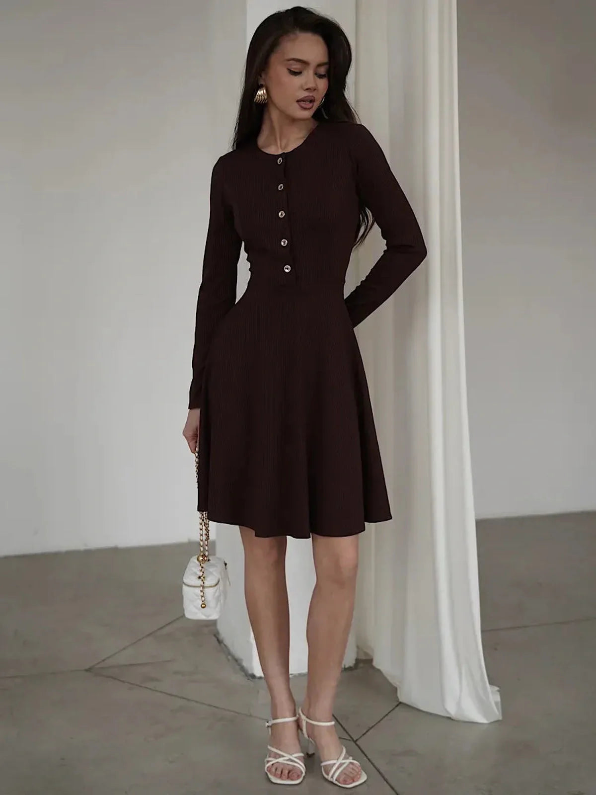 Elegant mocha mini dress with long sleeves and a flared silhouette, perfect for weddings or casual outings.