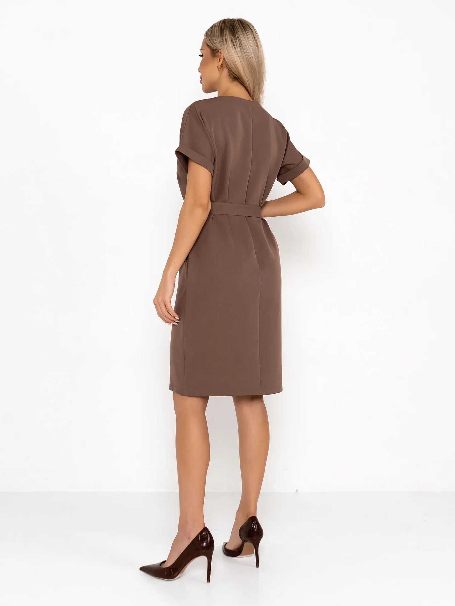 Back view of Mocha Frame mini dress in rich taupe with a fitted silhouette and removable belt, perfect for weddings and events.