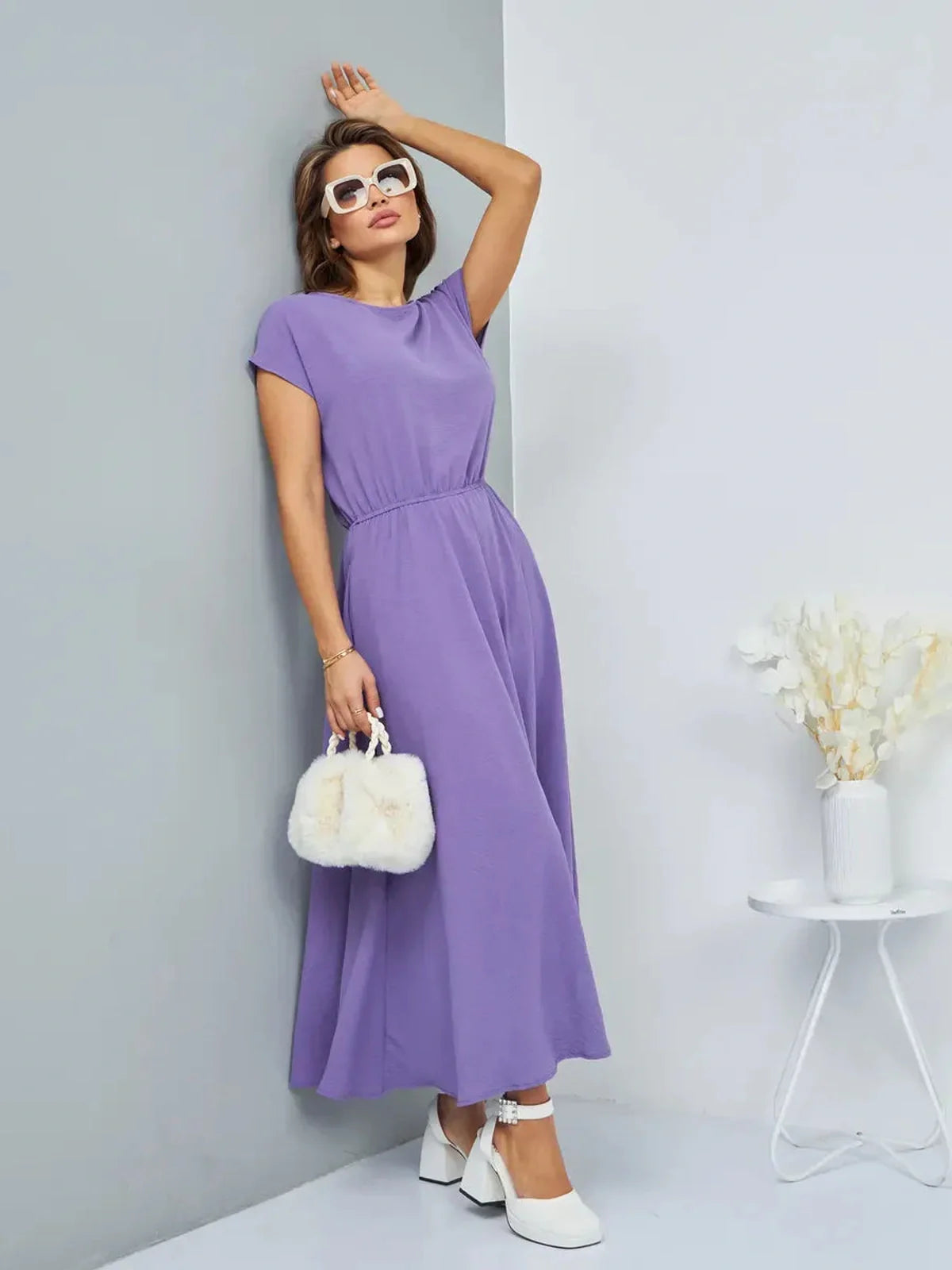 Elegant lavender maxi dress with a gathered waist, perfect for summer events and weddings.