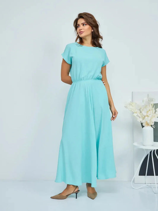 Light blue maxi dress with short sleeves and elastic waist, perfect for summer weddings and formal events.