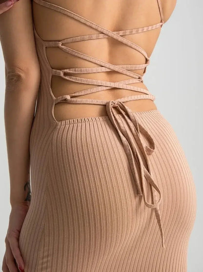 Nude lace midi dress featuring a corset back and ribbed knit fabric, perfect for summer events and formal occasions.