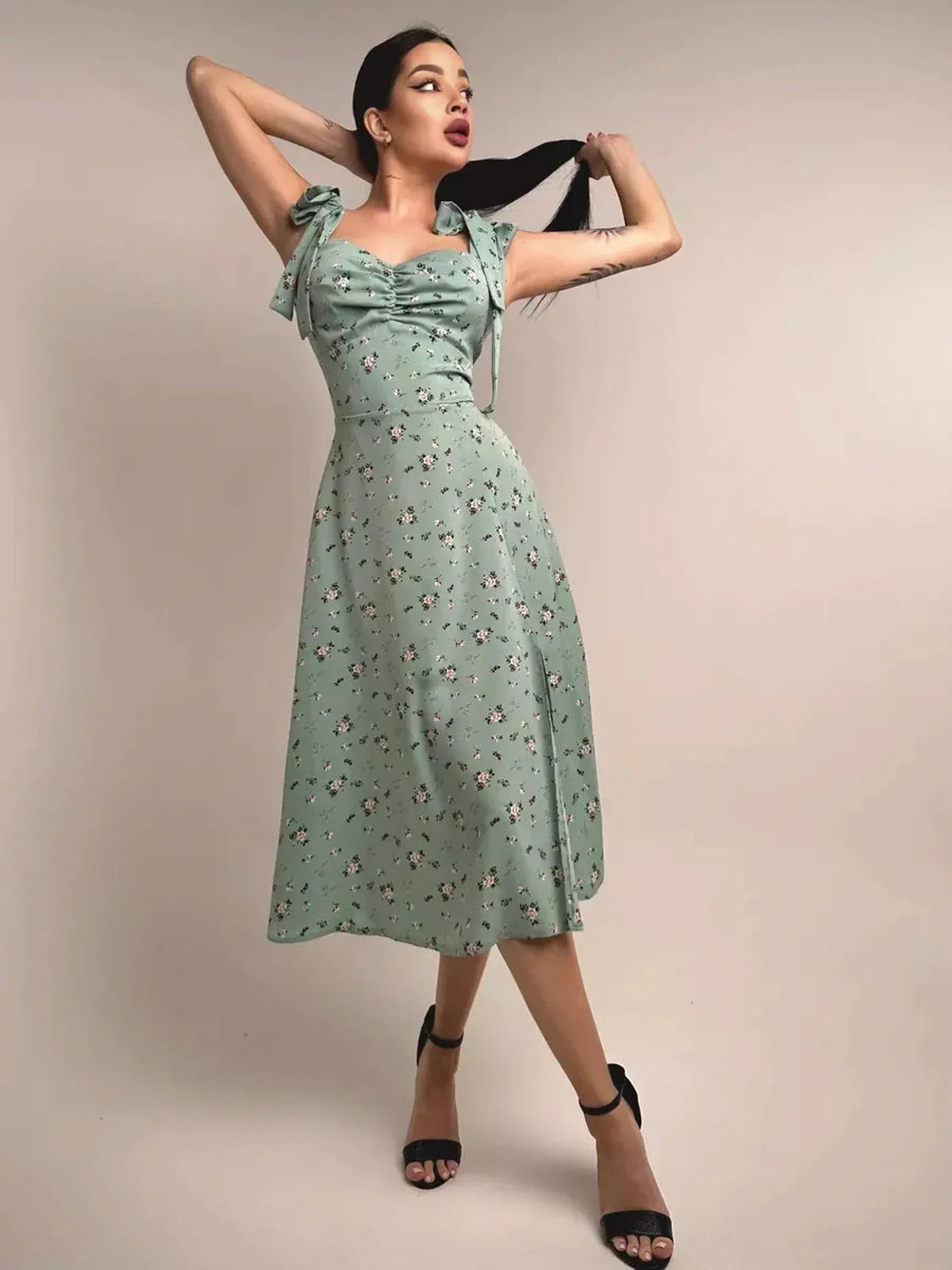 Flora Grace Midi Dress in mint with floral print, ruched sweetheart bodice, and flowing skirt, perfect for weddings and formal events.