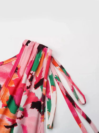 Close-up of the strappy neckline details on the colorful Sunset Stripe Midi Dress, perfect for summer and special occasions.