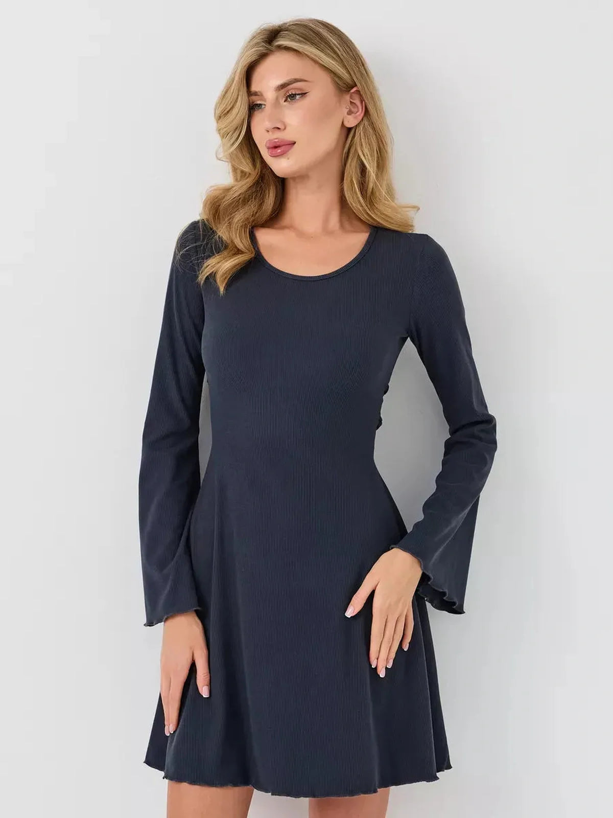 Graphite Grace mini dress in navy, featuring a fitted bodice and flared sleeves, perfect for summer and cocktail occasions.