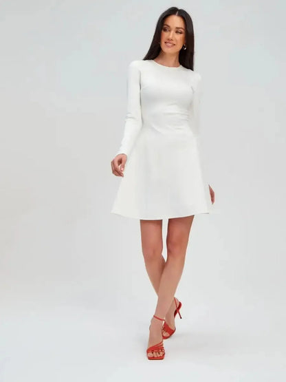 Ivory Sculpt Dress in crisp white, showcasing a form-fitting silhouette and A-line mini skirt, perfect for weddings and formal occasions.