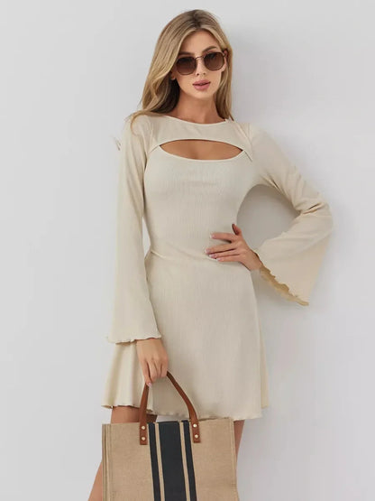 Sculpted Grace mini dress featuring a boat neckline and front cutout, perfect for weddings or casual outings.