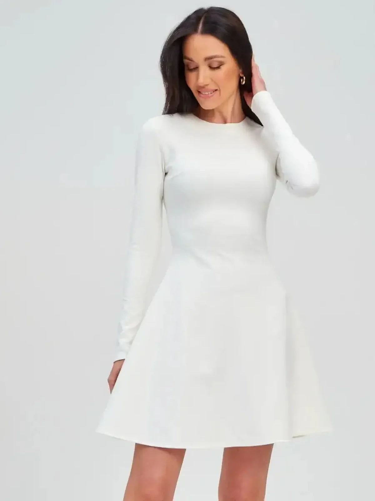Ivory Sculpt Dress featuring a minimalist A-line silhouette, perfect for weddings, graduations, and formal events.