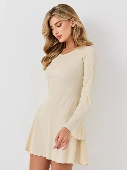 Ivory Flare mini dress with long sleeves and flared silhouette, perfect for summer events or cocktail parties.