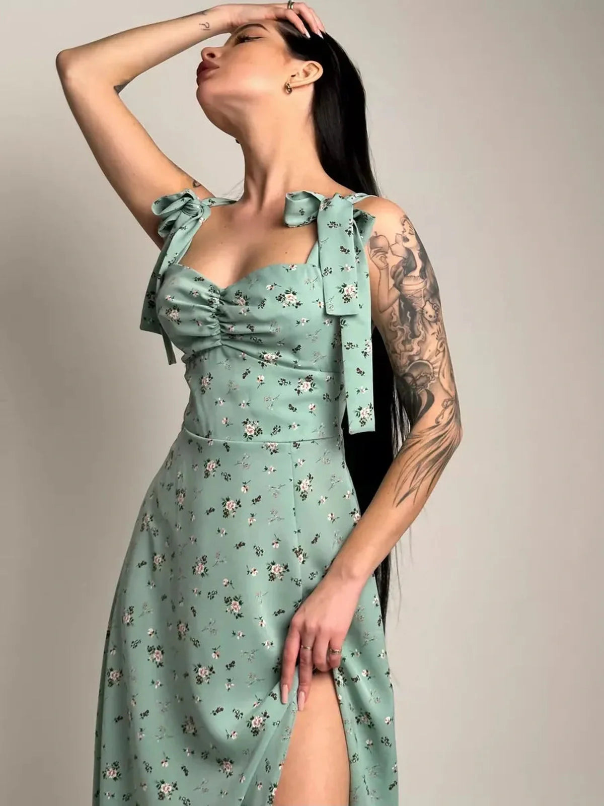 Flora Grace Midi Dress featuring floral print, ruched sweetheart bodice, and stylish side slit for elegant summer occasions.