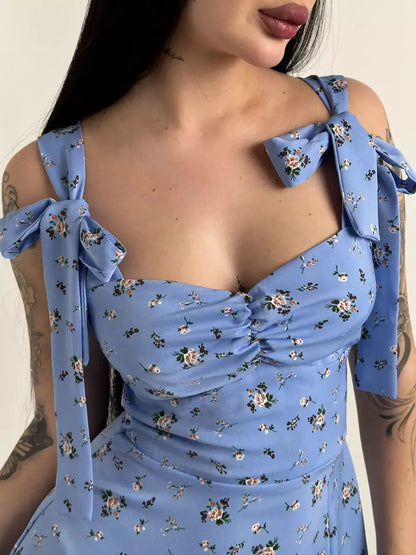 Floral Charm Midi Dress with shoulder bow ties and floral print, perfect for summer weddings and special occasions.