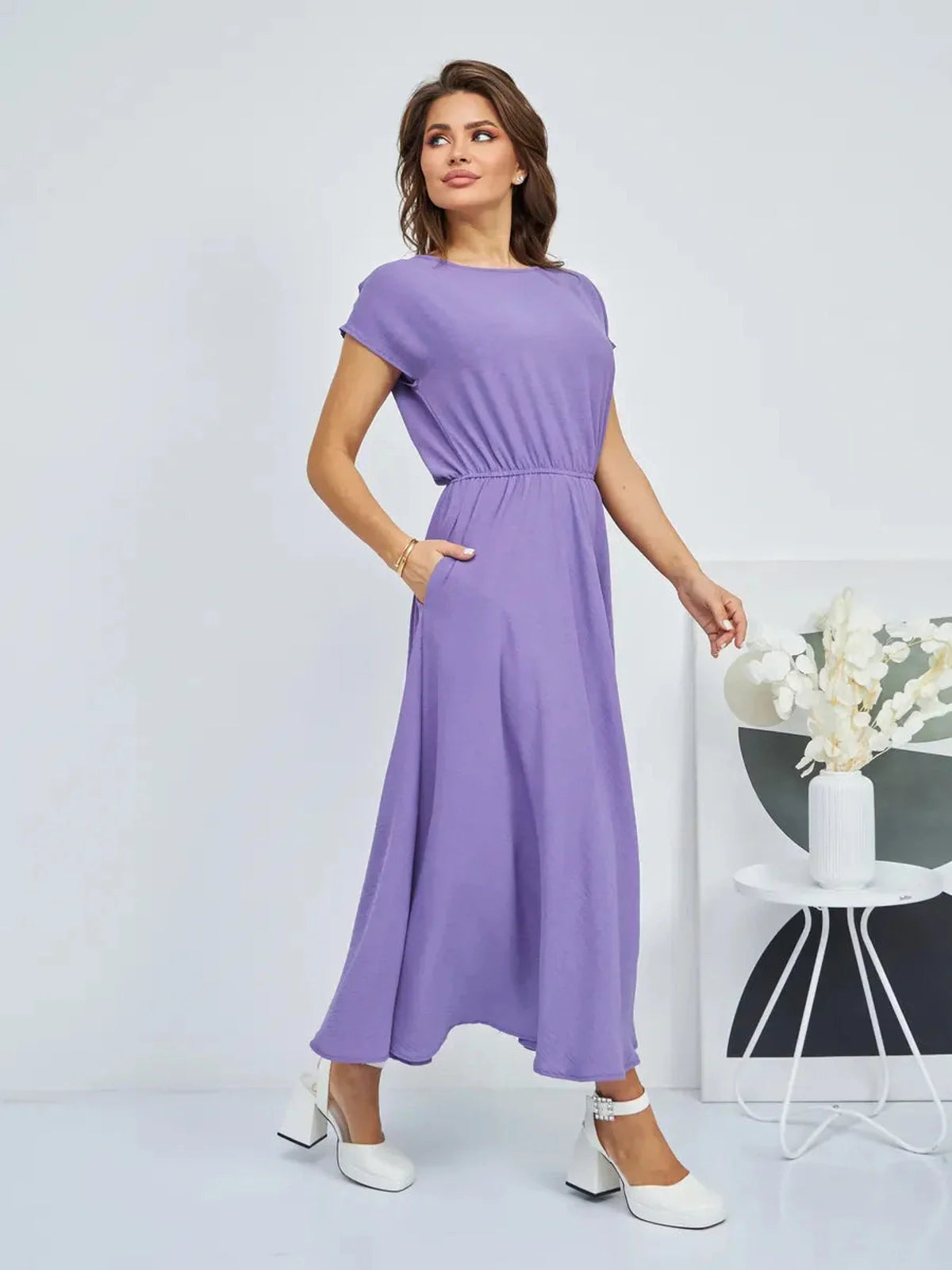 Model wearing a Lavender Breeze Maxi Dress, showcasing its lightweight elegance and flowing silhouette.