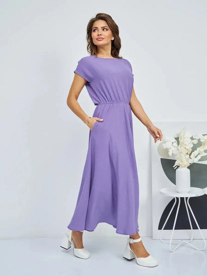 Model wearing a Lavender Breeze Maxi Dress, showcasing its lightweight elegance and flowing silhouette.
