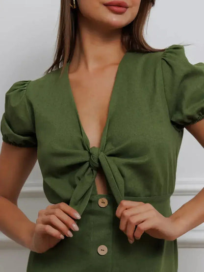 Olive Whisper Maxi Dress featuring puff sleeves and a charming tie-front design, perfect for summer occasions.