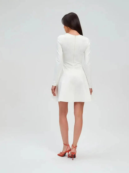 Back view of the Ivory Sculpt Dress, a minimalist white dress, perfect for weddings and formal occasions.