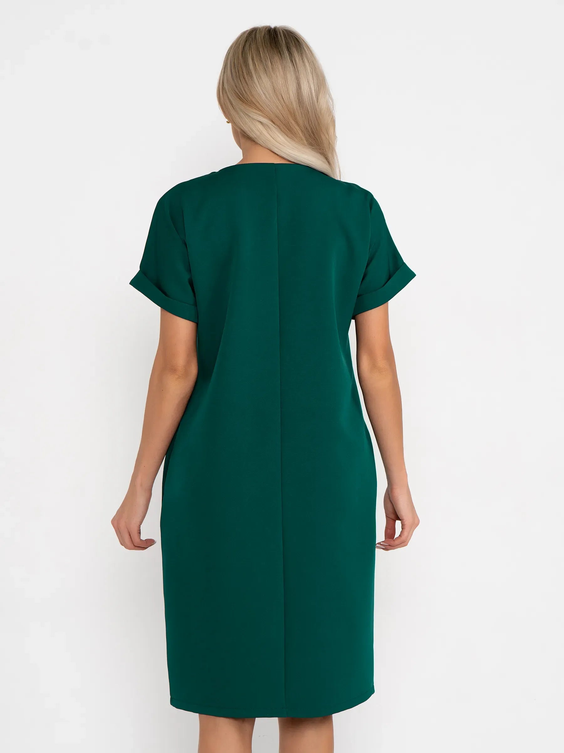 Back view of the Emerald Mode green mini dress with cuffed sleeves, perfect for summer weddings and formal occasions.